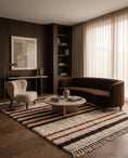 Load image into Gallery viewer, Brown, Terracotta and Cream striped wool rug in a furnished room

