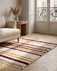 Load image into Gallery viewer, Burgundy, Ochre Yellow and Cream striped wool rug in a furnished room
