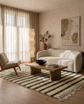 Load image into Gallery viewer, Olive Green and Cream striped wool rug in a furnished room
