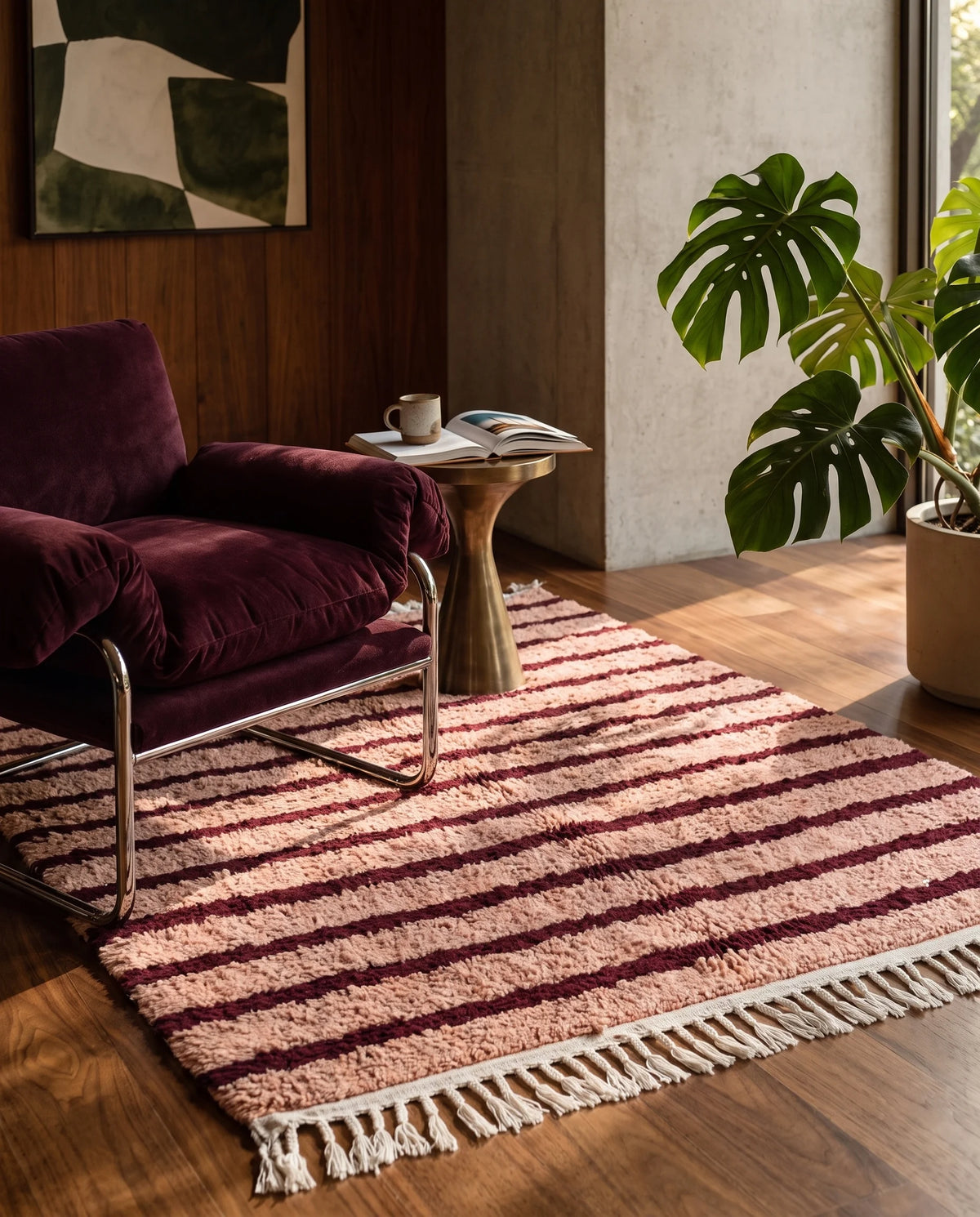 Burgundy and Blush Pink striped wool rug in a furnished room