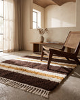Load image into Gallery viewer, Cream, Ochre Yellow and Dark Brown striped wool rug in a furnished room
