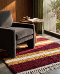 Load image into Gallery viewer, Ochre Yellow, Cream and Burgundy striped wool rug in a furnished room
