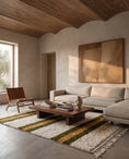 Load image into Gallery viewer, Olive Green, Ochre Yellow and Cream striped wool rug in a furnished room
