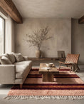 Load image into Gallery viewer, Burgundy, Terracotta and Blush Pink striped wool rug in a furnished room
