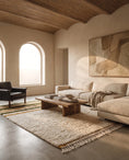 Load image into Gallery viewer, Olive Green, Ochre Yellow and Cream striped wool rug in a furnished room
