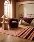 Load image into Gallery viewer, Burgundy, Terracotta and Blush Pink striped wool rug in a furnished room
