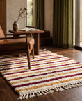 Load image into Gallery viewer, Burgundy, Ochre Yellow and Cream striped wool rug in a furnished room
