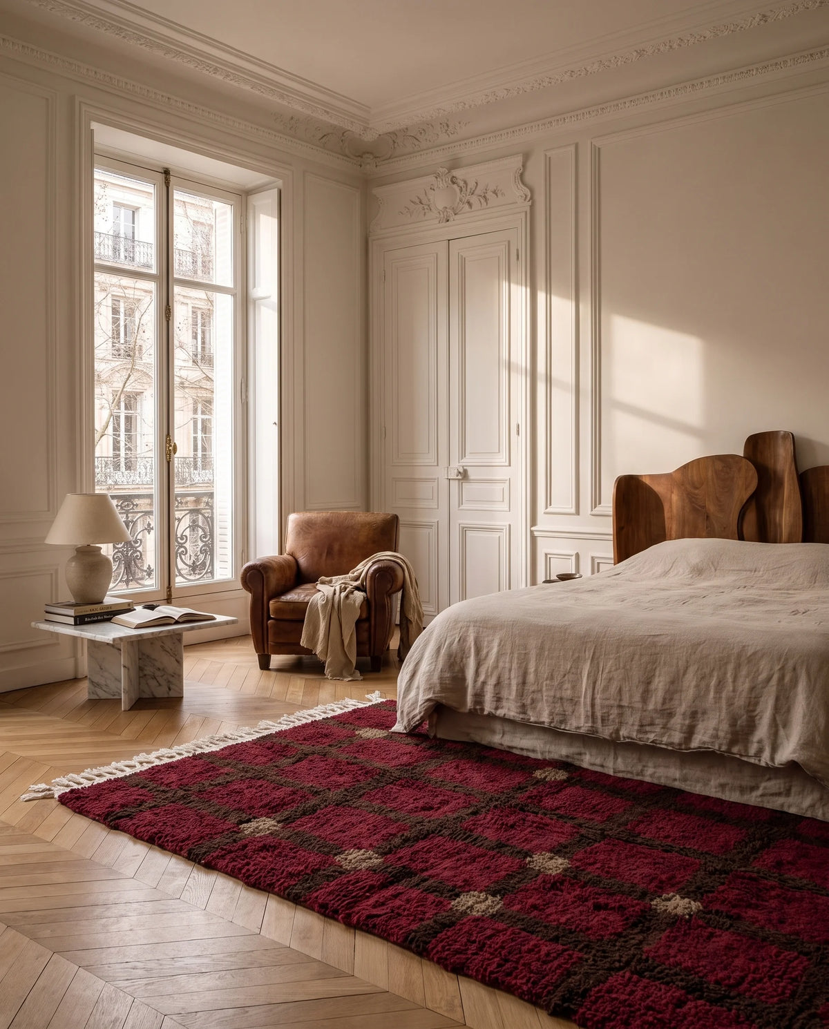 Brown, Taupe and Burgundy grid wool rug in a furnished room