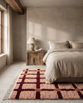 Load image into Gallery viewer, Burgundy, Terracotta and Blush Pink grid wool rug in a furnished room
