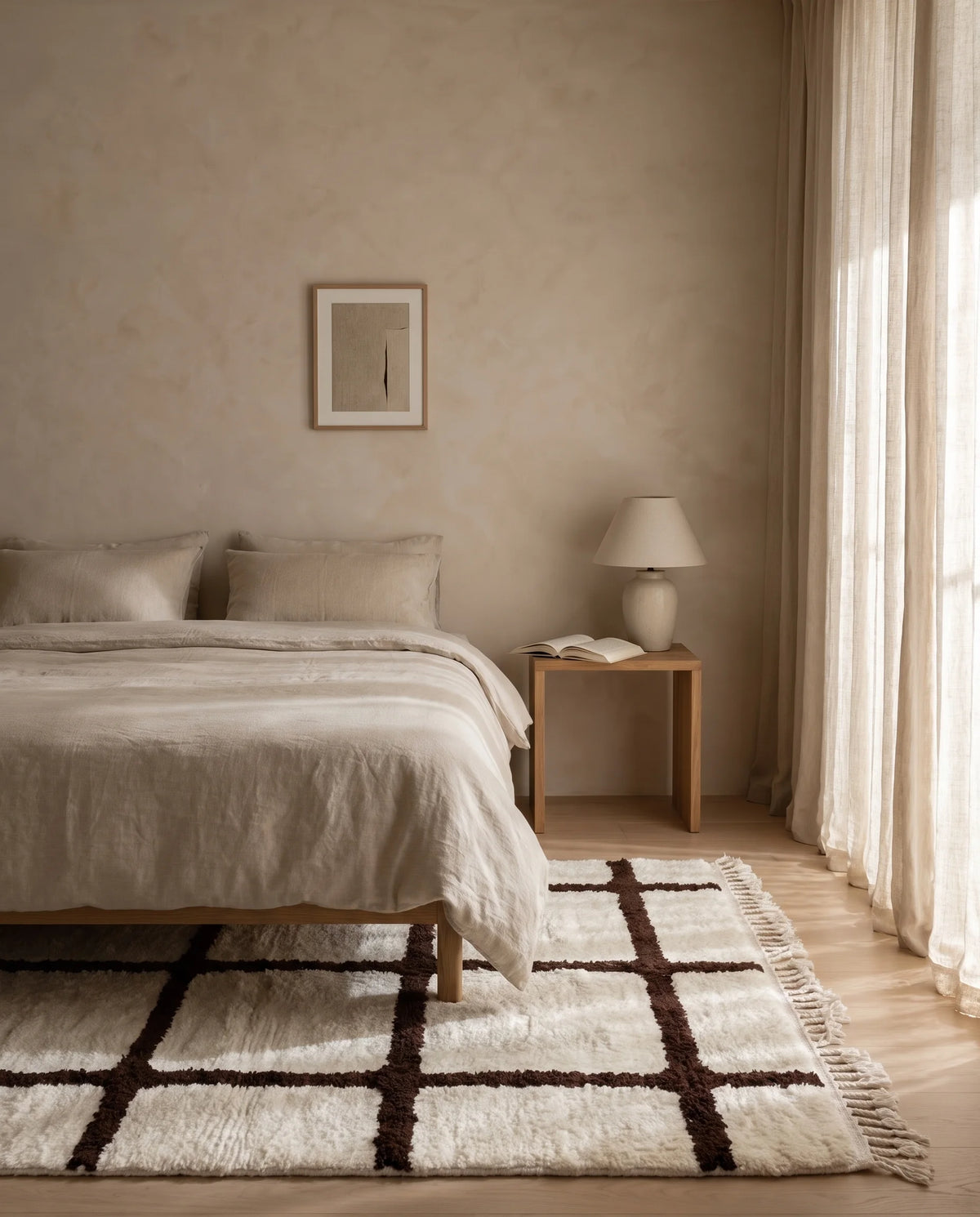 Brown and Cream grid wool rug in a furnished room