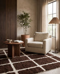 Load image into Gallery viewer, Cream and Dark Brown grid wool rug in a furnished room
