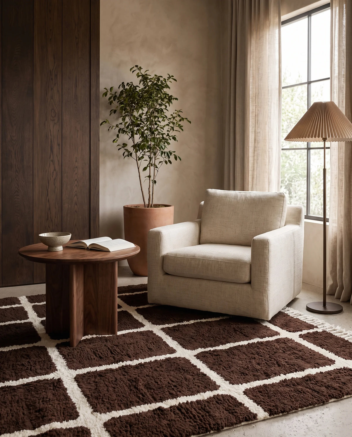 Cream and Dark Brown grid wool rug in a furnished room