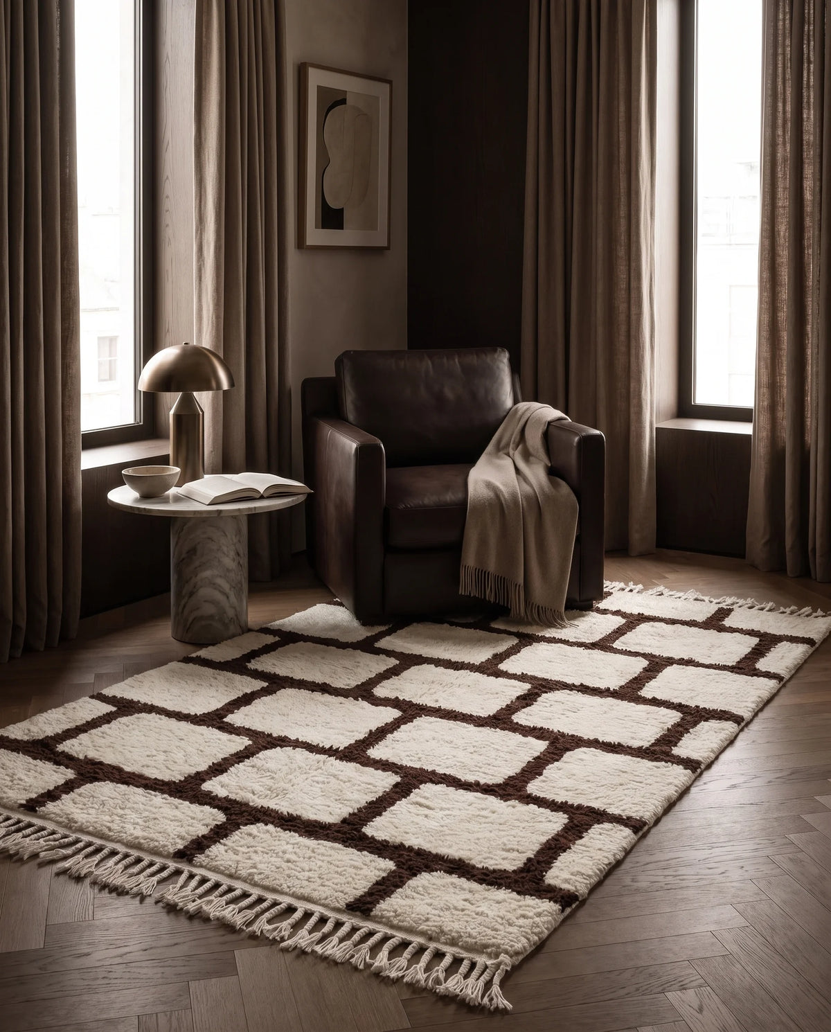 Brown and Cream grid wool rug in a furnished room