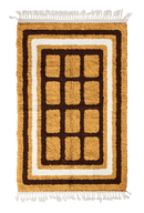 Frame Crossing grid wool rug, dark brown lines and cream accents on ochre yellow, full view