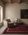 Load image into Gallery viewer, Brown, Taupe and Burgundy grid wool rug in a furnished room

