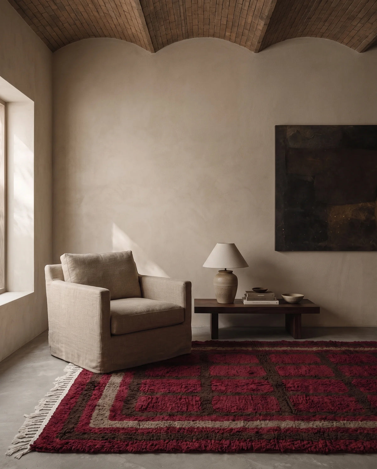 Brown, Taupe and Burgundy grid wool rug in a furnished room