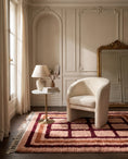 Load image into Gallery viewer, Burgundy, Terracotta and Blush Pink grid wool rug in a furnished room

