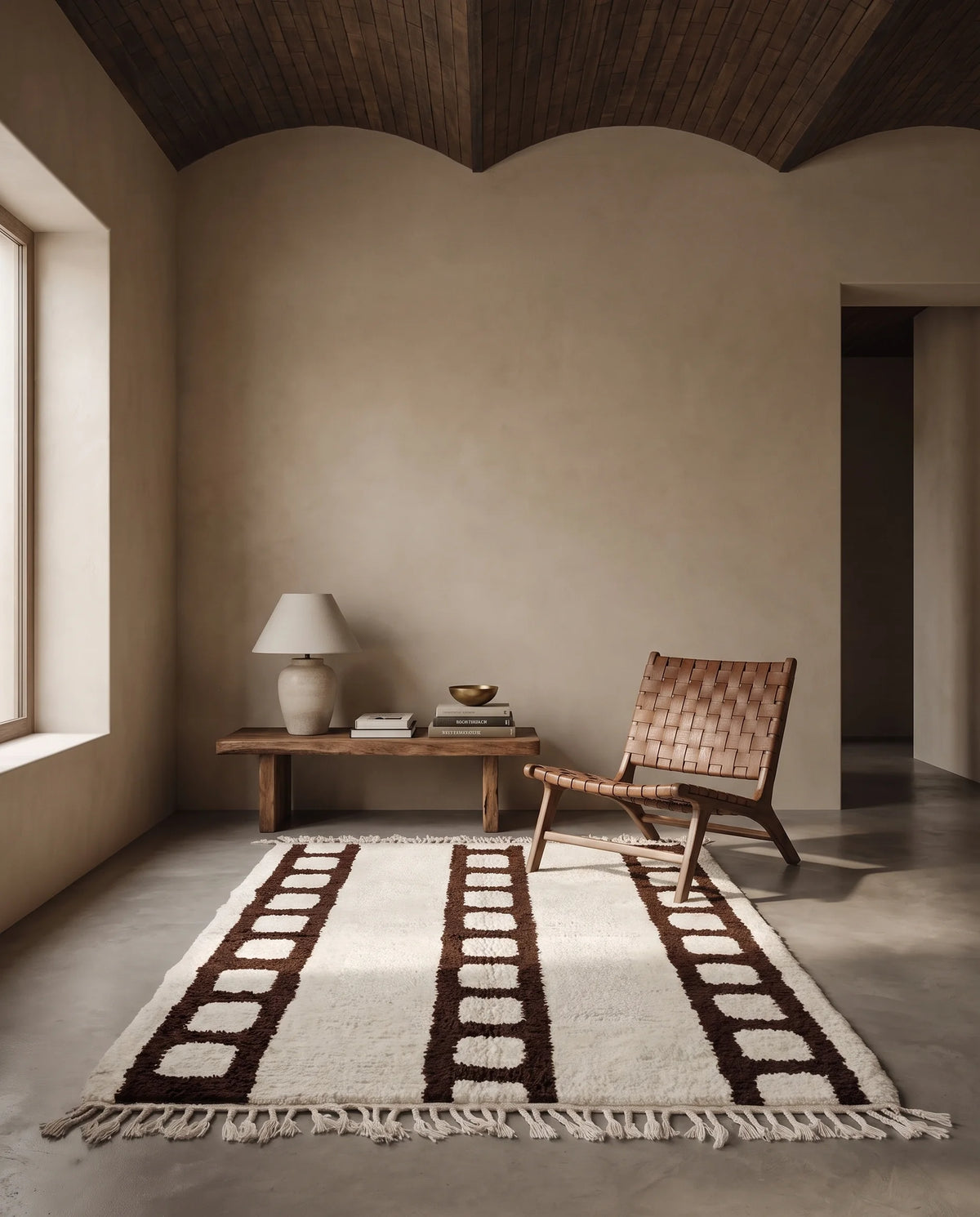 Brown and Cream grid wool rug in a furnished room