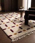 Load image into Gallery viewer, Burgundy, Ochre Yellow and Cream grid wool rug in a furnished room
