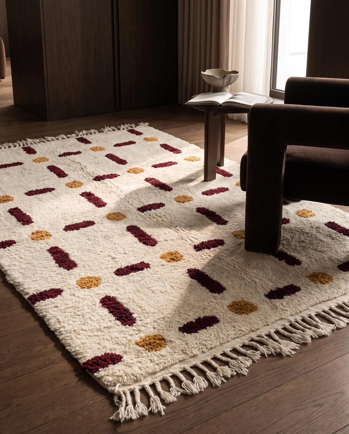 Burgundy, Ochre Yellow and Cream grid wool rug in a furnished room
