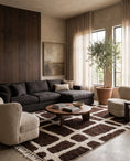 Load image into Gallery viewer, Cream and Dark Brown grid wool rug in a furnished room
