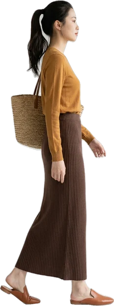 Woman walking: woman with dark hair in a high ponytail walking to the right in side profile