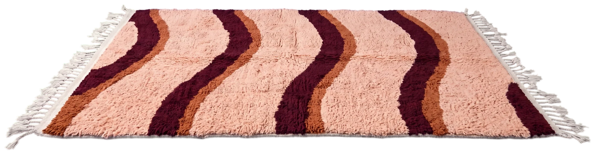 Swell Tide wool rug with wavy lines in oxblood and terracotta on blush, laid flat