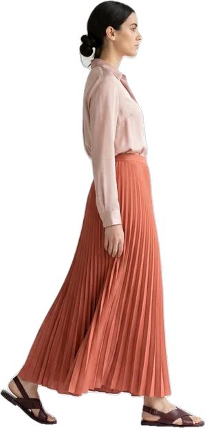 Woman walking: woman with dark hair in knot walking to the right in side profile