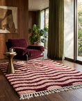 Load image into Gallery viewer, Burgundy and Blush Pink wavy wool rug in a furnished room
