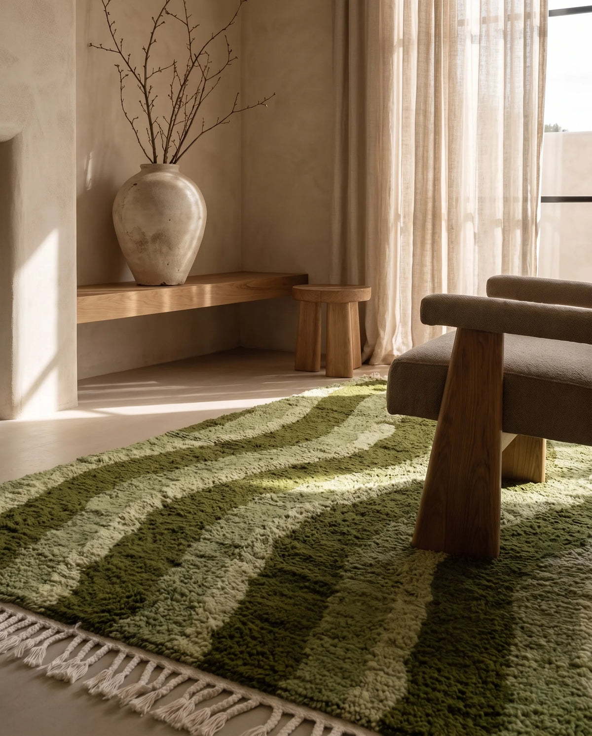 Moss, Sage and Olive Green wavy wool rug in a furnished room