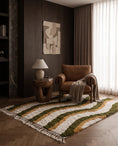 Load image into Gallery viewer, Olive Green, Ochre Yellow and Cream wavy wool rug in a furnished room
