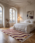 Load image into Gallery viewer, Burgundy, Ochre Yellow and Cream wavy wool rug in a furnished room
