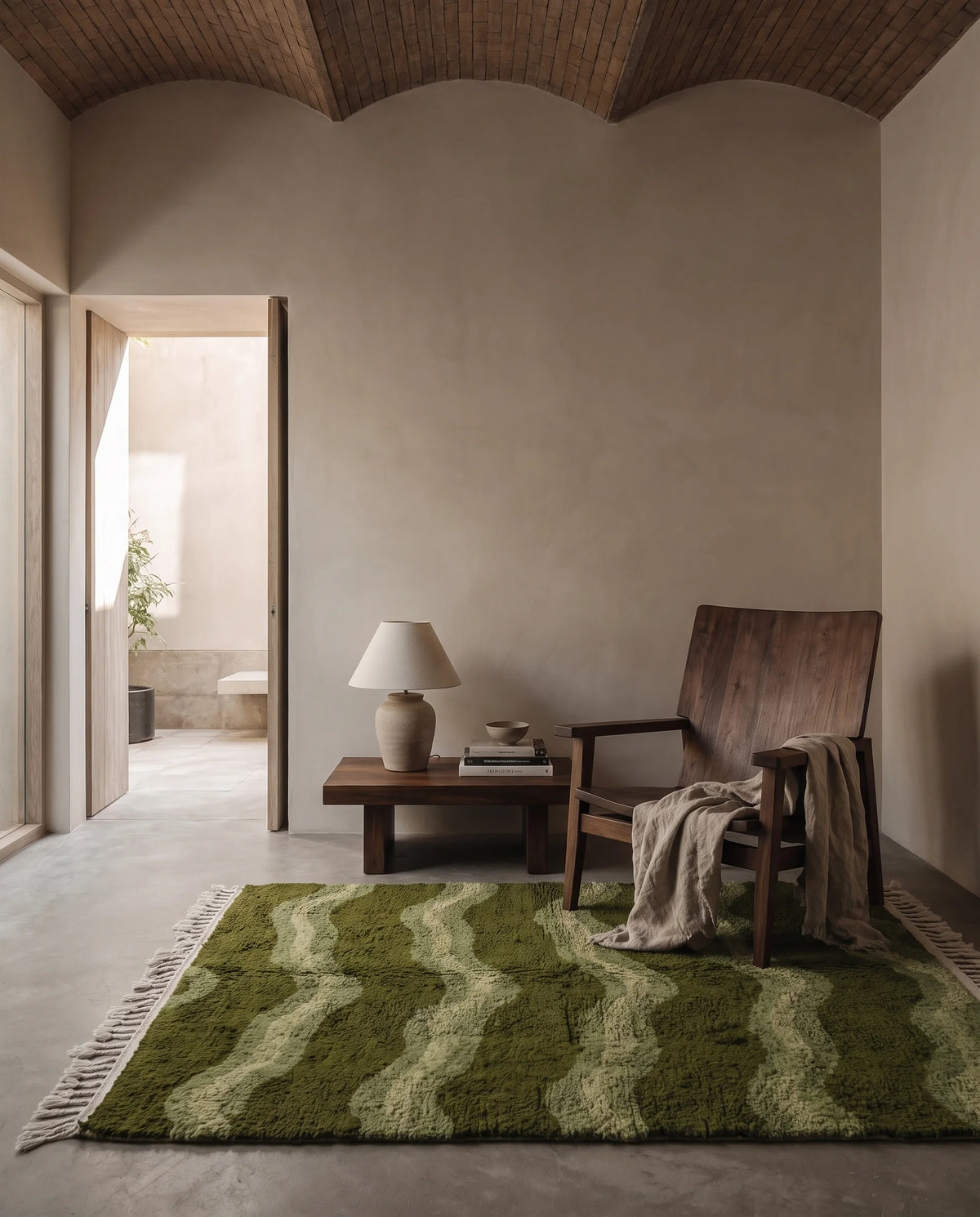 Moss, Sage and Olive Green wavy wool rug in a furnished room