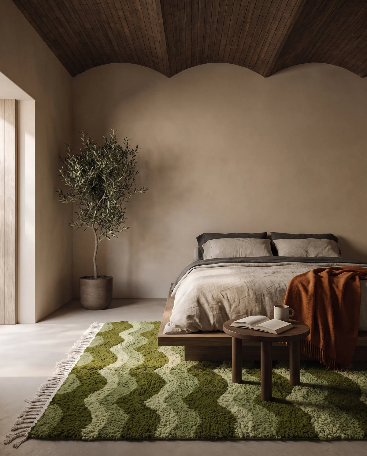 Moss, Sage and Olive Green wavy wool rug in a furnished room