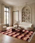Load image into Gallery viewer, Burgundy, Terracotta and Blush Pink wavy wool rug in a furnished room
