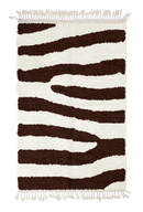 Fork Stride zebra stripe wool rug, dark brown stripes on cream, full view from above with fringed ends