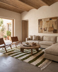 Load image into Gallery viewer, Olive Green and Cream zebra stripe wool rug in a furnished room
