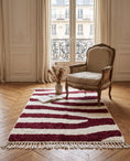 Load image into Gallery viewer, Burgundy and Cream zebra stripe wool rug in a furnished room
