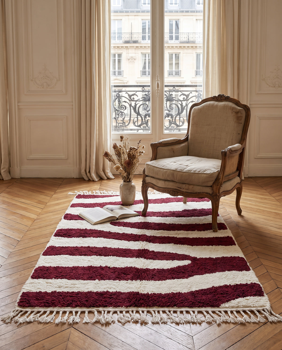 Burgundy and Cream zebra stripe wool rug in a furnished room