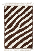 Slant Stride zebra stripe wool rug, cream stripes on dark espresso brown, full view from above with fringed ends