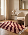 Load image into Gallery viewer, Burgundy and Blush Pink zebra stripe wool rug in a furnished room
