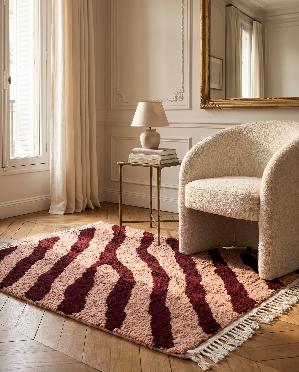 Burgundy and Blush Pink zebra stripe wool rug in a furnished room