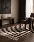 Load image into Gallery viewer, Brown and Cream zebra stripe wool rug in a furnished room

