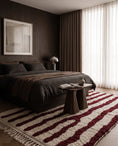 Load image into Gallery viewer, Burgundy and Cream zebra stripe wool rug in a furnished room
