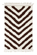 Arrow Stride zebra stripe wool rug, dark brown stripes on cream, full view from above with fringed ends