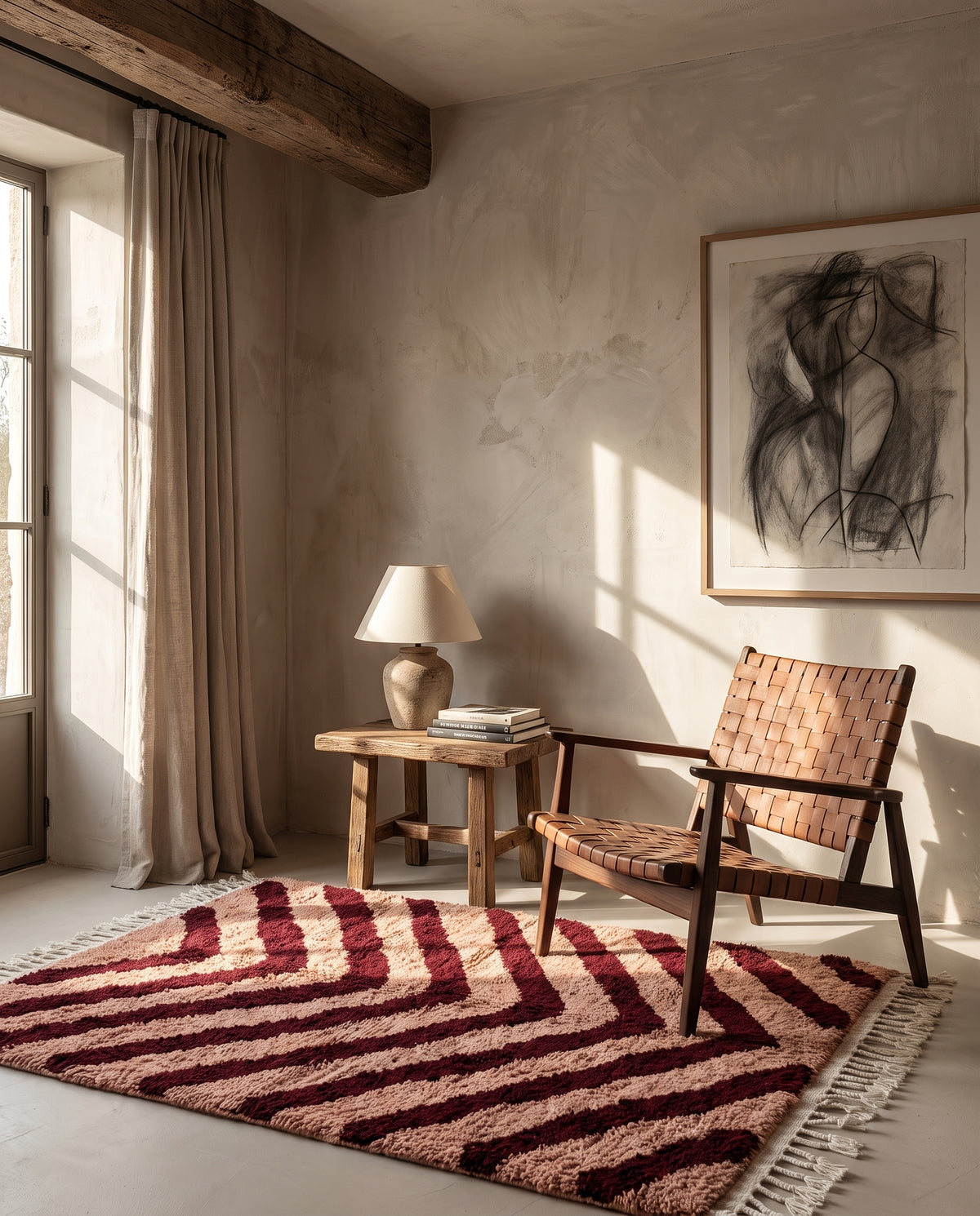 Burgundy and Blush Pink zebra stripe wool rug in a furnished room