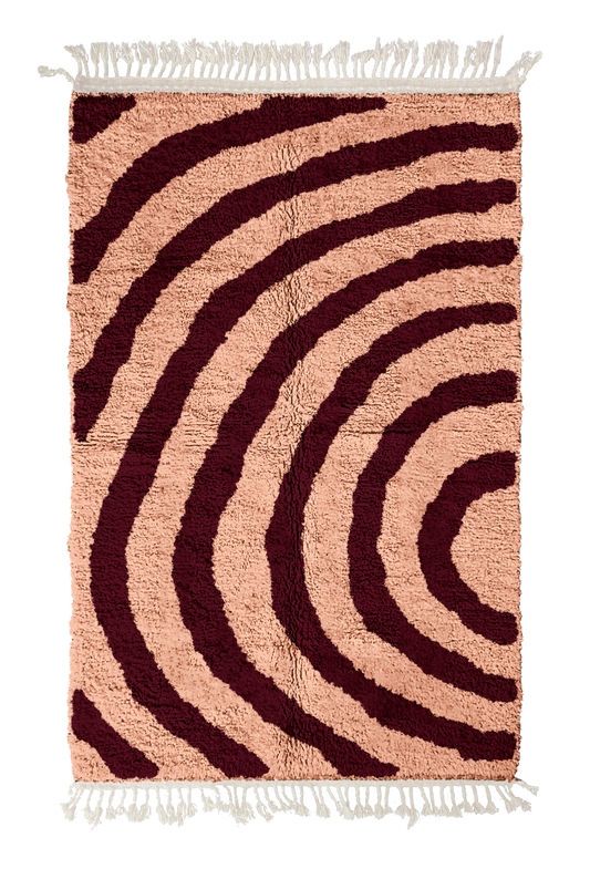 Arc Stride zebra stripe wool rug, oxblood red stripes on blush pink, full view from above with fringed ends