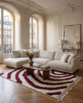 Load image into Gallery viewer, Burgundy and Cream zebra stripe wool rug in a furnished room
