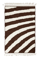 Turning Stride zebra stripe wool rug, cream stripes on dark espresso brown, full view from above with fringed ends