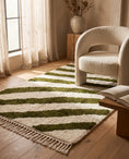 Load image into Gallery viewer, Olive Green and Cream zebra stripe wool rug in a furnished room
